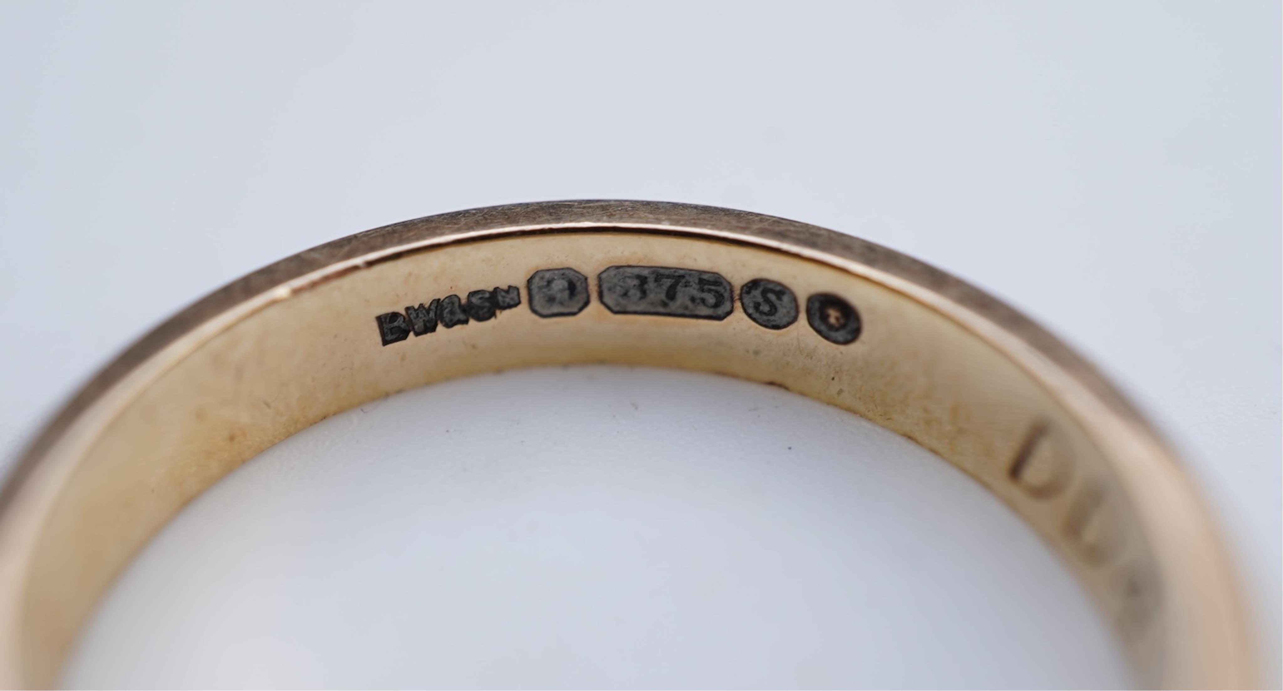 A collection of six gold wedding bands